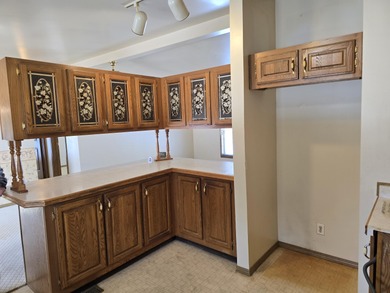 Golf course living on Thunder Bay Golf Course overlooking Hole on Thunder Bay Golf Resort in Michigan - for sale on GolfHomes.com, golf home, golf lot