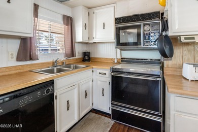 *ON LEASED LAND* Have you always dreamed of island living? Now on London Bridge Golf Course in Arizona - for sale on GolfHomes.com, golf home, golf lot