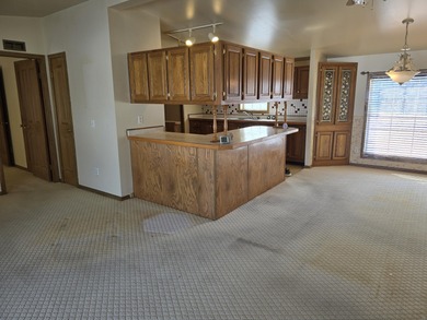 Golf course living on Thunder Bay Golf Course overlooking Hole on Thunder Bay Golf Resort in Michigan - for sale on GolfHomes.com, golf home, golf lot