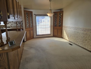 Golf course living on Thunder Bay Golf Course overlooking Hole on Thunder Bay Golf Resort in Michigan - for sale on GolfHomes.com, golf home, golf lot