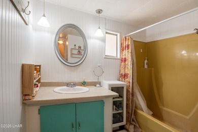 *ON LEASED LAND* Have you always dreamed of island living? Now on London Bridge Golf Course in Arizona - for sale on GolfHomes.com, golf home, golf lot