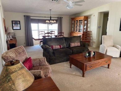Discover this beautifully furnished 3-bedroom, 2-bathroom home on Crystal Lake Club in Florida - for sale on GolfHomes.com, golf home, golf lot