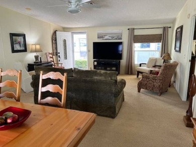 Discover this beautifully furnished 3-bedroom, 2-bathroom home on Crystal Lake Club in Florida - for sale on GolfHomes.com, golf home, golf lot