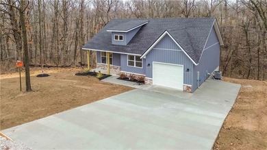 Open house this weekend at this new construction home! Located on Bella Vista Country Club - Highlands in Arkansas - for sale on GolfHomes.com, golf home, golf lot