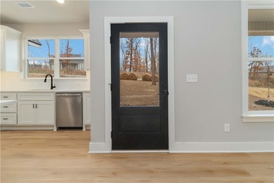 Open house this weekend at this new construction home! Located on Bella Vista Country Club - Highlands in Arkansas - for sale on GolfHomes.com, golf home, golf lot