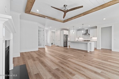 The Sanderling IV by Bell Custom Homes offers a spacious on Cape Fear National At Brunswick Forest in North Carolina - for sale on GolfHomes.com, golf home, golf lot