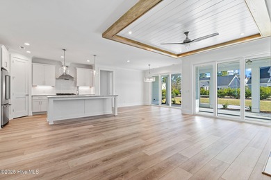 The Sanderling IV by Bell Custom Homes offers a spacious on Cape Fear National At Brunswick Forest in North Carolina - for sale on GolfHomes.com, golf home, golf lot