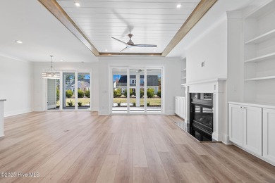 The Sanderling IV by Bell Custom Homes offers a spacious on Cape Fear National At Brunswick Forest in North Carolina - for sale on GolfHomes.com, golf home, golf lot