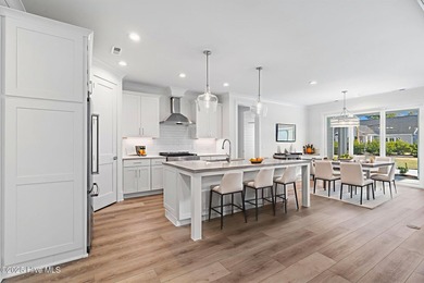 The Sanderling IV by Bell Custom Homes offers a spacious on Cape Fear National At Brunswick Forest in North Carolina - for sale on GolfHomes.com, golf home, golf lot