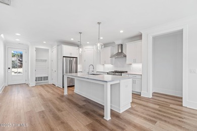 The Sanderling IV by Bell Custom Homes offers a spacious on Cape Fear National At Brunswick Forest in North Carolina - for sale on GolfHomes.com, golf home, golf lot