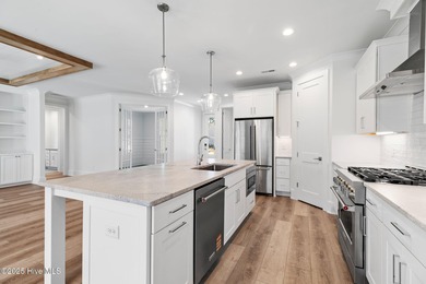 The Sanderling IV by Bell Custom Homes offers a spacious on Cape Fear National At Brunswick Forest in North Carolina - for sale on GolfHomes.com, golf home, golf lot