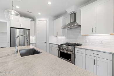 The Sanderling IV by Bell Custom Homes offers a spacious on Cape Fear National At Brunswick Forest in North Carolina - for sale on GolfHomes.com, golf home, golf lot