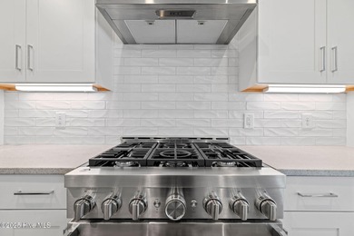 The Sanderling IV by Bell Custom Homes offers a spacious on Cape Fear National At Brunswick Forest in North Carolina - for sale on GolfHomes.com, golf home, golf lot