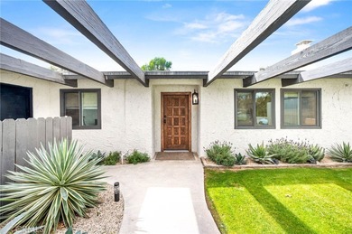 This thoughtfully curated 2-bedroom, 2-bath residence is ideally on Palm Desert Country Club in California - for sale on GolfHomes.com, golf home, golf lot