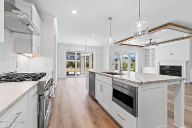 The Sanderling IV by Bell Custom Homes offers a spacious on Cape Fear National At Brunswick Forest in North Carolina - for sale on GolfHomes.com, golf home, golf lot