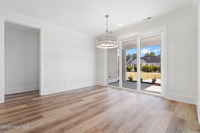 The Sanderling IV by Bell Custom Homes offers a spacious on Cape Fear National At Brunswick Forest in North Carolina - for sale on GolfHomes.com, golf home, golf lot