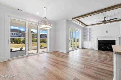 The Sanderling IV by Bell Custom Homes offers a spacious on Cape Fear National At Brunswick Forest in North Carolina - for sale on GolfHomes.com, golf home, golf lot