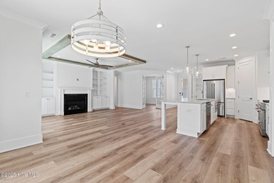 The Sanderling IV by Bell Custom Homes offers a spacious on Cape Fear National At Brunswick Forest in North Carolina - for sale on GolfHomes.com, golf home, golf lot