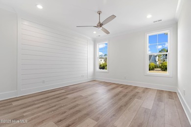 The Sanderling IV by Bell Custom Homes offers a spacious on Cape Fear National At Brunswick Forest in North Carolina - for sale on GolfHomes.com, golf home, golf lot