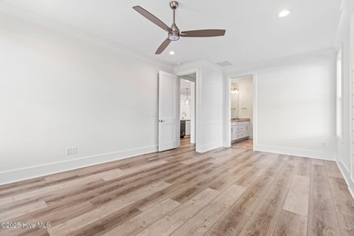 The Sanderling IV by Bell Custom Homes offers a spacious on Cape Fear National At Brunswick Forest in North Carolina - for sale on GolfHomes.com, golf home, golf lot