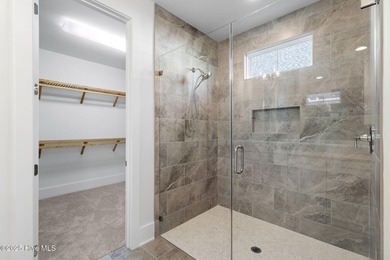 The Sanderling IV by Bell Custom Homes offers a spacious on Cape Fear National At Brunswick Forest in North Carolina - for sale on GolfHomes.com, golf home, golf lot