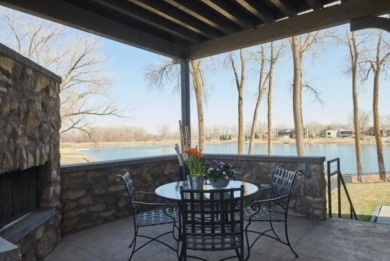 Architectural Masterpiece privately located on Spanish Bay in on Dakota Dunes Country Club in South Dakota - for sale on GolfHomes.com, golf home, golf lot