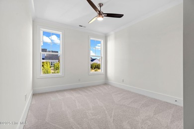 The Sanderling IV by Bell Custom Homes offers a spacious on Cape Fear National At Brunswick Forest in North Carolina - for sale on GolfHomes.com, golf home, golf lot