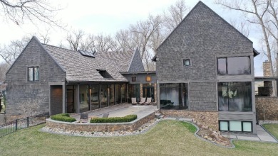 Architectural Masterpiece privately located on Spanish Bay in on Dakota Dunes Country Club in South Dakota - for sale on GolfHomes.com, golf home, golf lot