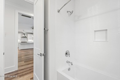 The Sanderling IV by Bell Custom Homes offers a spacious on Cape Fear National At Brunswick Forest in North Carolina - for sale on GolfHomes.com, golf home, golf lot