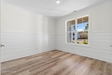 The Sanderling IV by Bell Custom Homes offers a spacious on Cape Fear National At Brunswick Forest in North Carolina - for sale on GolfHomes.com, golf home, golf lot