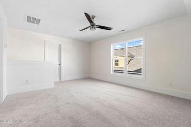 The Sanderling IV by Bell Custom Homes offers a spacious on Cape Fear National At Brunswick Forest in North Carolina - for sale on GolfHomes.com, golf home, golf lot