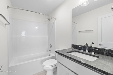 The Sanderling IV by Bell Custom Homes offers a spacious on Cape Fear National At Brunswick Forest in North Carolina - for sale on GolfHomes.com, golf home, golf lot