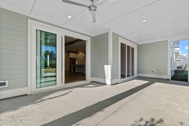 The Sanderling IV by Bell Custom Homes offers a spacious on Cape Fear National At Brunswick Forest in North Carolina - for sale on GolfHomes.com, golf home, golf lot