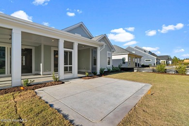 The Sanderling IV by Bell Custom Homes offers a spacious on Cape Fear National At Brunswick Forest in North Carolina - for sale on GolfHomes.com, golf home, golf lot