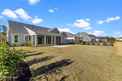The Sanderling IV by Bell Custom Homes offers a spacious on Cape Fear National At Brunswick Forest in North Carolina - for sale on GolfHomes.com, golf home, golf lot