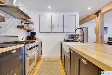 This beautiful home has been completely renovated down to the on Pocono Farms Country Club in Pennsylvania - for sale on GolfHomes.com, golf home, golf lot