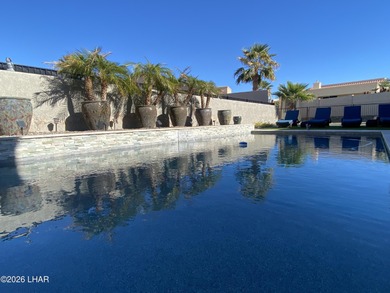 2713 Plaza Verde is a home beyond ordinary! Premier Residential on London Bridge Golf Course in Arizona - for sale on GolfHomes.com, golf home, golf lot