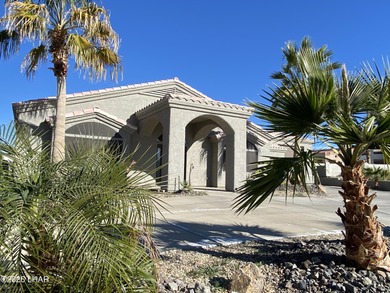 2713 Plaza Verde is a home beyond ordinary! Premier Residential on London Bridge Golf Course in Arizona - for sale on GolfHomes.com, golf home, golf lot