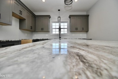 Spec Home Now Under Construction - Stunning Custom Ranch in the on Spring Meadows Country Club in Michigan - for sale on GolfHomes.com, golf home, golf lot