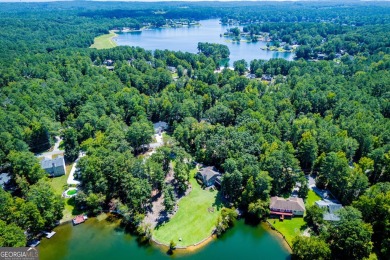 Discover lakeside living at its finest with this stunning on Fairfield Plantation Golf and Country Club in Georgia - for sale on GolfHomes.com, golf home, golf lot
