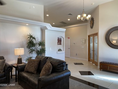 2713 Plaza Verde is a home beyond ordinary! Premier Residential on London Bridge Golf Course in Arizona - for sale on GolfHomes.com, golf home, golf lot