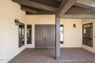 Prestigiously located just before the first tee of the golf on London Bridge Golf Course in Arizona - for sale on GolfHomes.com, golf home, golf lot