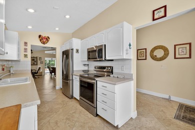 Welcome to Marsh Landings at PGA Village! This 3-bedroom, 3-bath on The Legacy Golf and Tennis Club in Florida - for sale on GolfHomes.com, golf home, golf lot