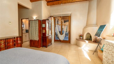 Located on a private cul-de-sac on the 8th hole of the Sunrise on The Club At Las Campanas  in New Mexico - for sale on GolfHomes.com, golf home, golf lot