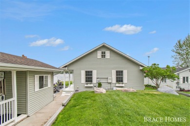 Don't miss this incredible opportunity to own the lakehouse of on Holland Lake Golf Course Inc. in Michigan - for sale on GolfHomes.com, golf home, golf lot