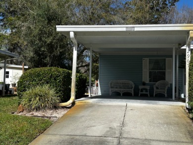This 3 bedroom, 2 bath home is being offered mostly furnished on Whisperwood Golf Course in Florida - for sale on GolfHomes.com, golf home, golf lot
