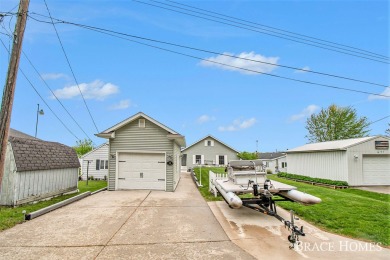 Don't miss this incredible opportunity to own the lakehouse of on Holland Lake Golf Course Inc. in Michigan - for sale on GolfHomes.com, golf home, golf lot