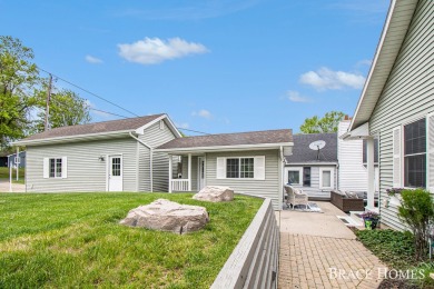 Don't miss this incredible opportunity to own the lakehouse of on Holland Lake Golf Course Inc. in Michigan - for sale on GolfHomes.com, golf home, golf lot