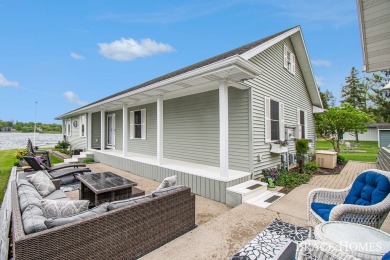 Don't miss this incredible opportunity to own the lakehouse of on Holland Lake Golf Course Inc. in Michigan - for sale on GolfHomes.com, golf home, golf lot