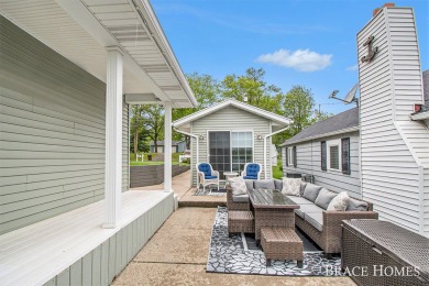 Don't miss this incredible opportunity to own the lakehouse of on Holland Lake Golf Course Inc. in Michigan - for sale on GolfHomes.com, golf home, golf lot